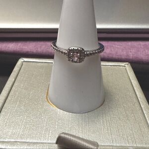 .925 Size 8 Elegant .925 Sterling Silver Ring with light pink Stone